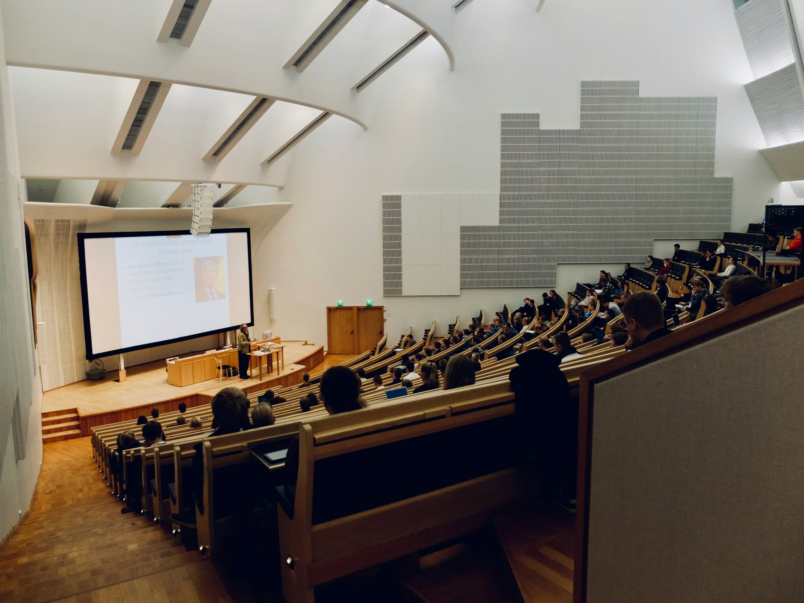 Students seated in a university lecture hall
