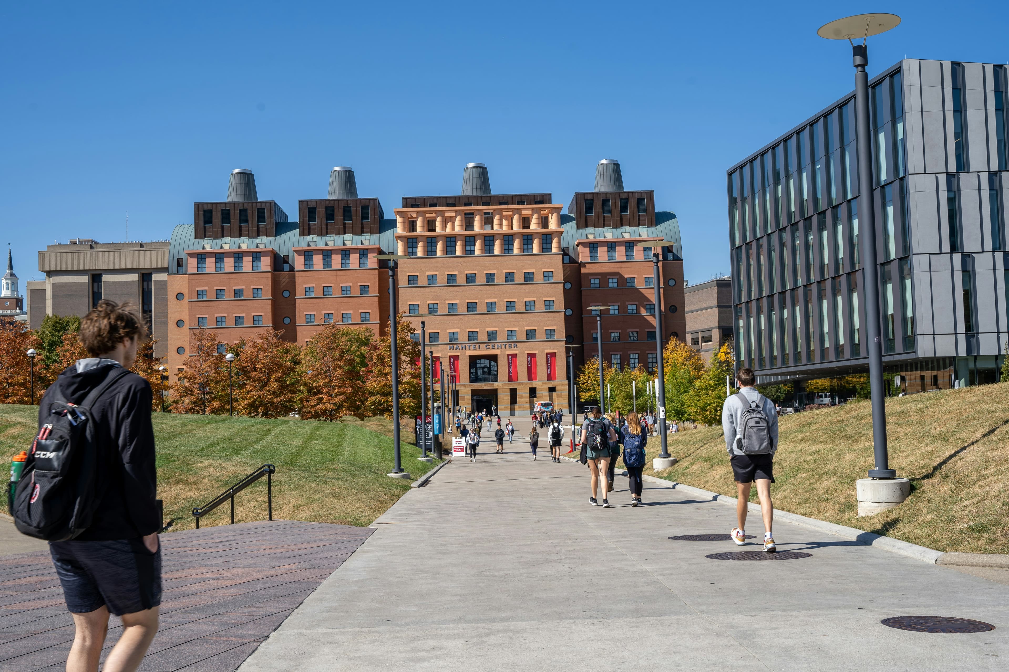 People walking between university buildings