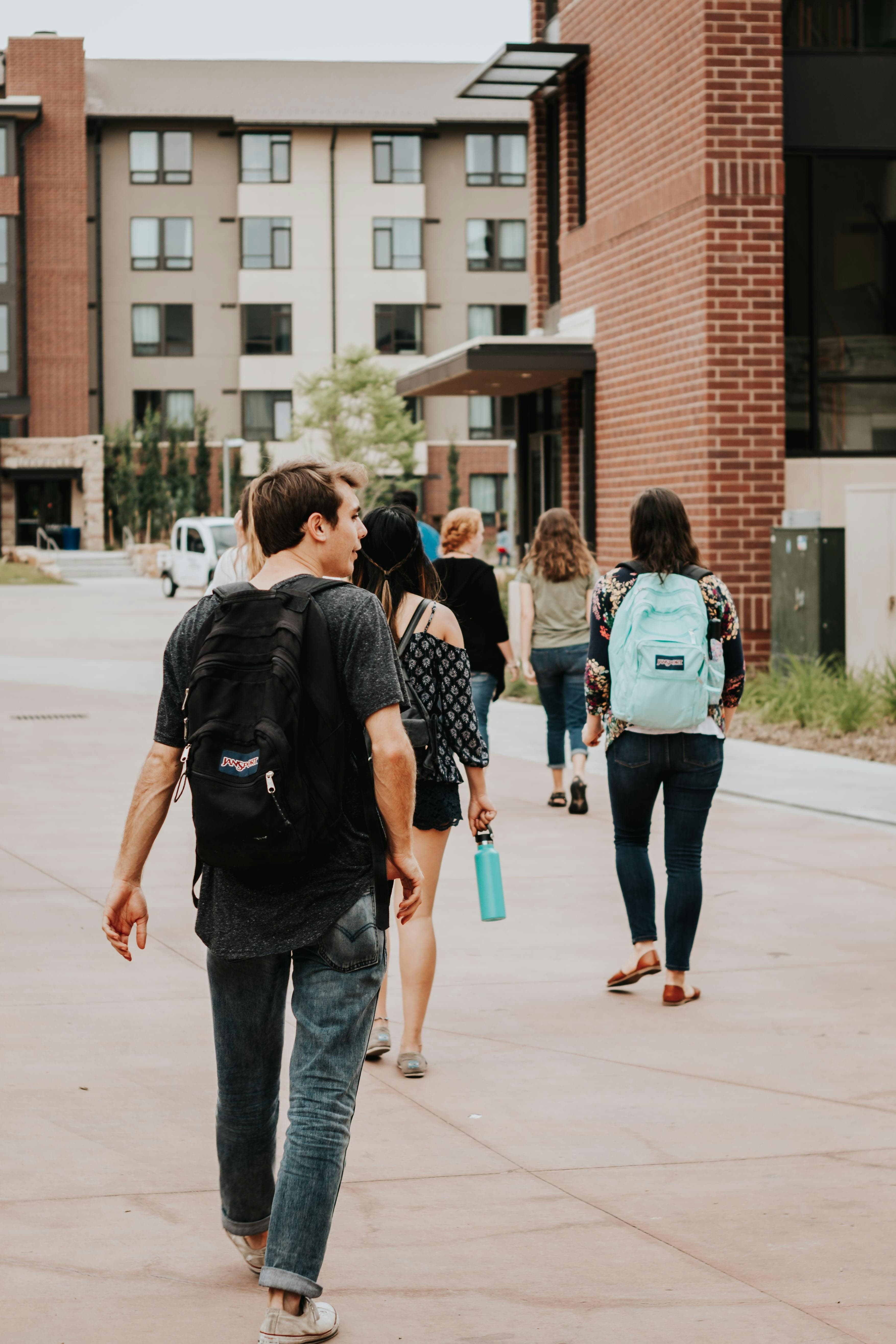Students walking together along a campus path