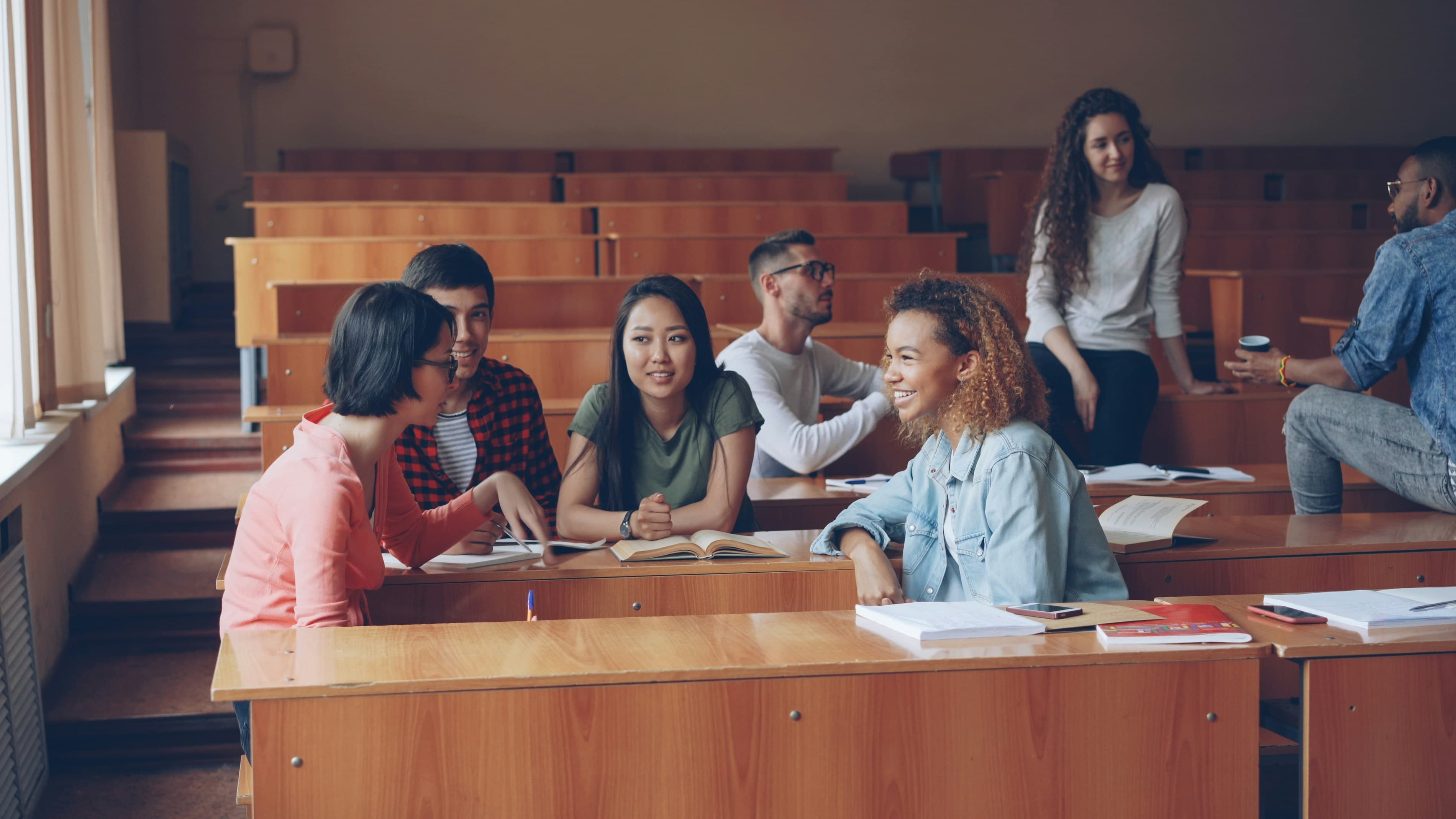 Students collaborating at a table in a classroom